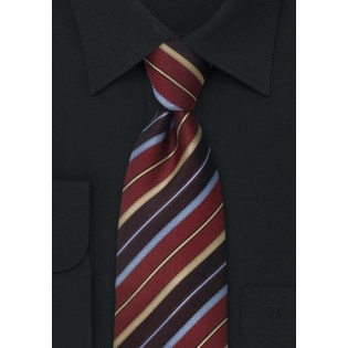 Stripes silk tie in shades of blue, burgundy, and gold - Handmade silk tie from Parsley